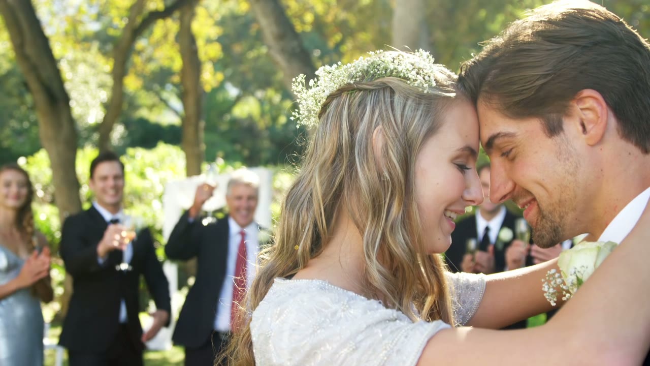 Newlywed couple sharing a close embrace